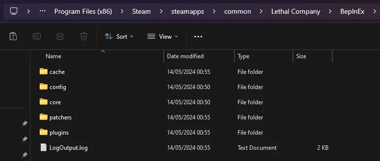 Screenshot of the BepInEx folder inside the 'Lethal Company' directory on a Windows computer, showing various subfolders and a file organized for mod management. The folders include 'cache', 'config', 'core', 'patchers', and 'plugins', all modified on 14/05/2024. There is also a 'LogOutput.log' file, providing details on the operations and changes made by the mods. This layout demonstrates the structured approach to organizing mod-related files within the game's directory.