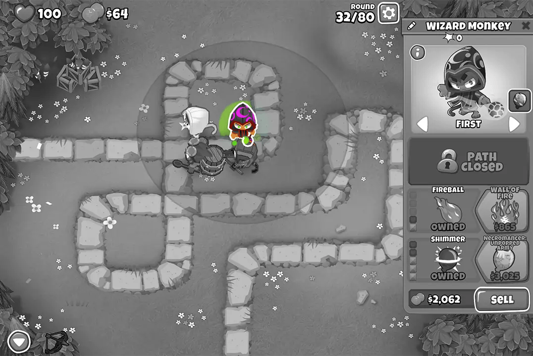 A game screenshot from "Bloons TD 6" on round 32 showing the Wizard Monkey. The Wizard Monkey is selected with upgrade paths including "Fireball" and "Wall of Fire."