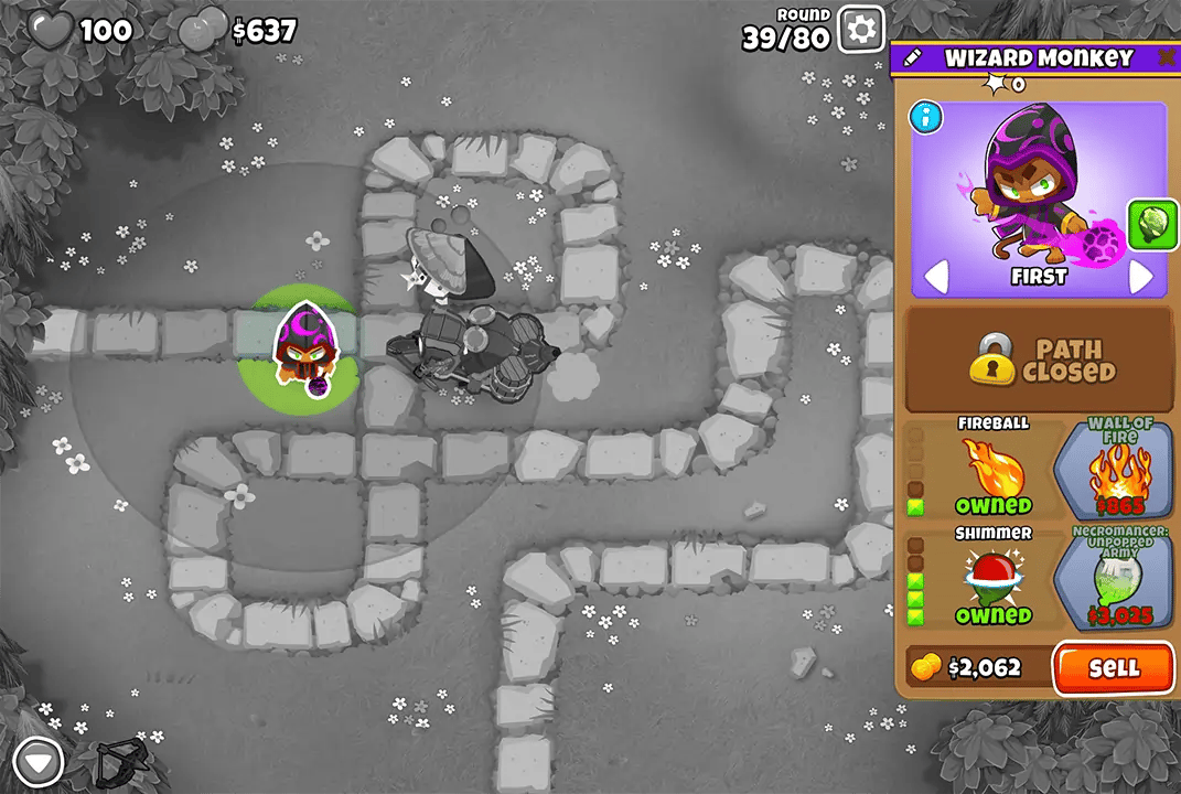 Bloons TD 6 screenshot of Round 39 on Monkey Meadow with Magic Monkeys only. The Wizard Monkey, selected and upgraded with Fireball and Shimmer, is in the center.