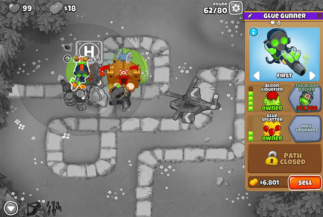 Bloons TD 6 screenshot of Round 62 on Monkey Meadow for Double HP MOABs mode. A Glue Gunner, selected and upgraded with Bloon Liquefier and Glue Splatter, is on the left. Nearby are a Heli Pilot, Quincy, and Alchemist, all contributing to the defense.