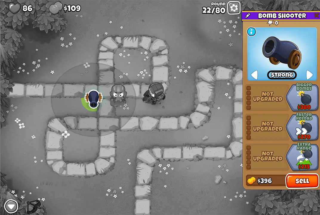 Bloons TD 6 screenshot of Round 22 on Monkey Meadow for Half Cash mode. The Bomb Shooter is selected, showing potential upgrades. Quincy and another monkey are visible on the path, defending against the bloons.