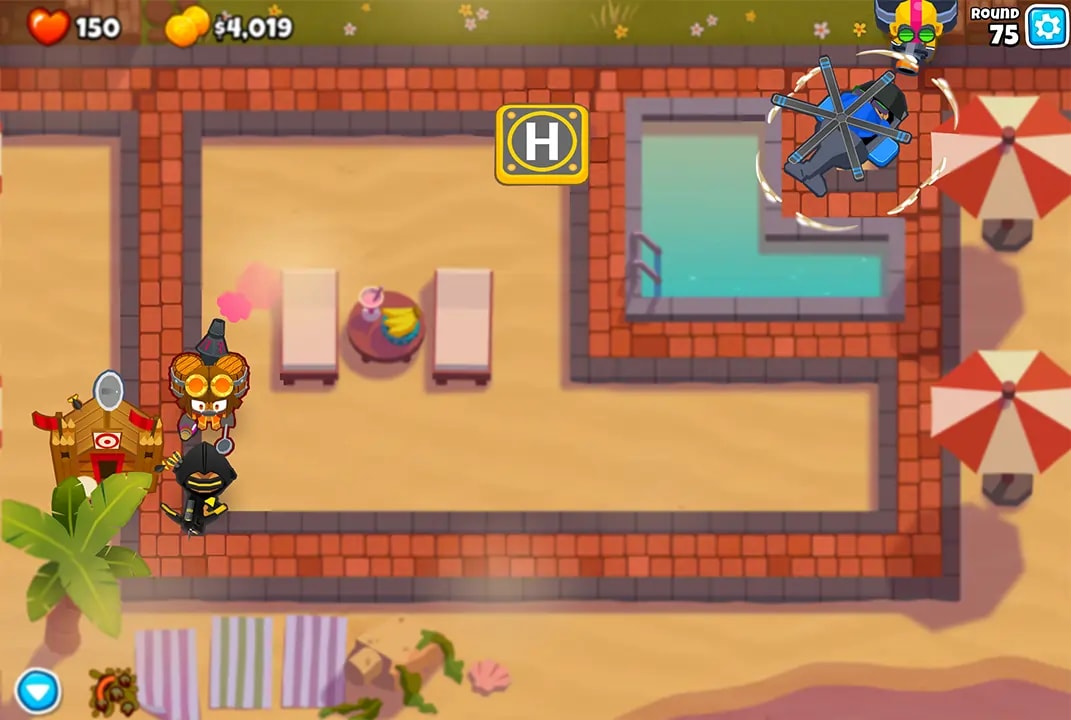 Screenshot of a regrow farm setup on a resort map in BTD6 during round 75. The setup includes a Dart Monkey Crossbow Master, a Downdraft Heli Pilot, and a Monkey Village on the left side of the screen, with the track leading to a pool on the right.